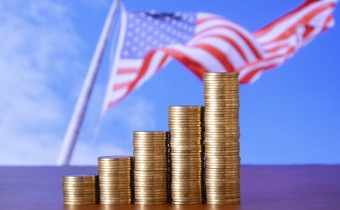 Which of the following is not a function of money